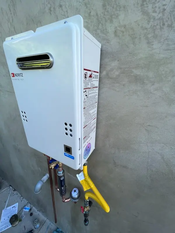 Tankless water heater installation for 11th Street Bridge homes